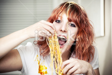stock-photo-11354678-girl-eating-spaghetti-with-hands