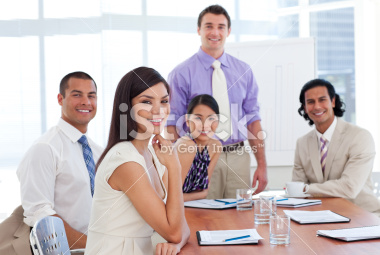stock-photo-12076709-international-business-associates-in-a-meeting