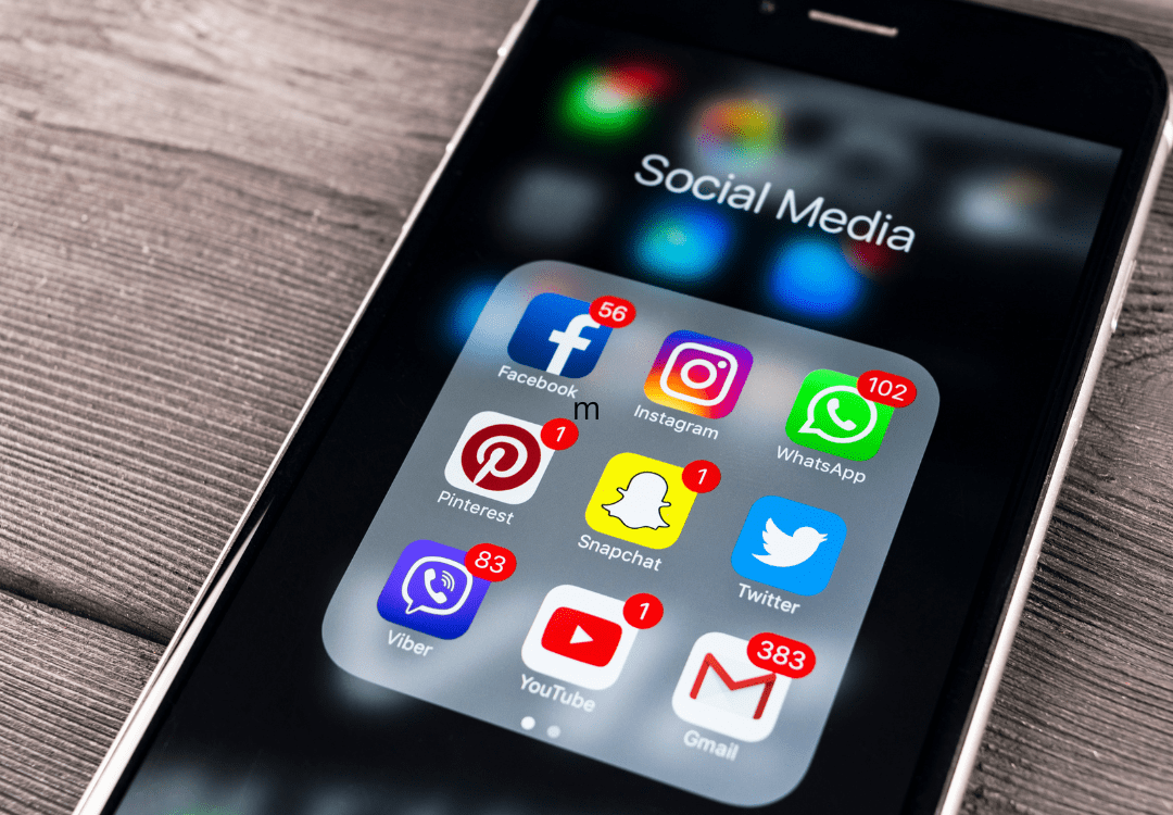 cell phone open on social media apps