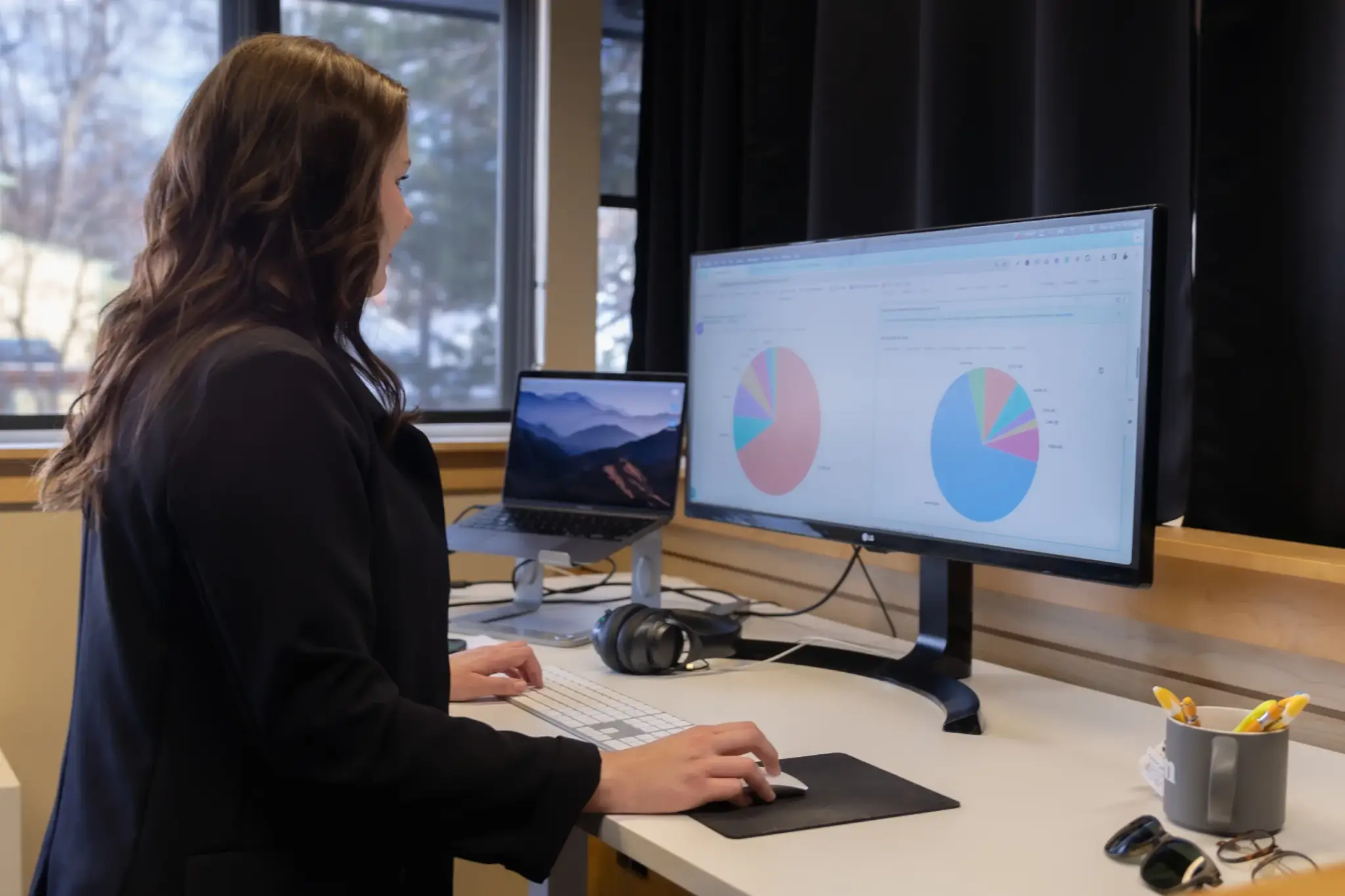 woman looking at seo data on her computer screen